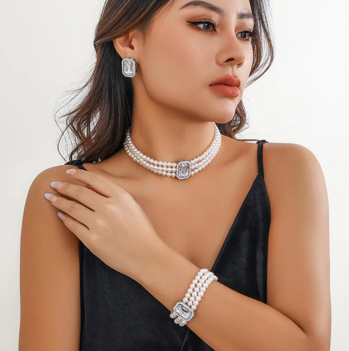 Modeschmuck Perlen Set für Damen Halskette Armband und Ohrringe